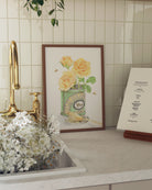 Framed A Spoonful of Sunshine art print styled in a cosy country kitchen with warm morning light