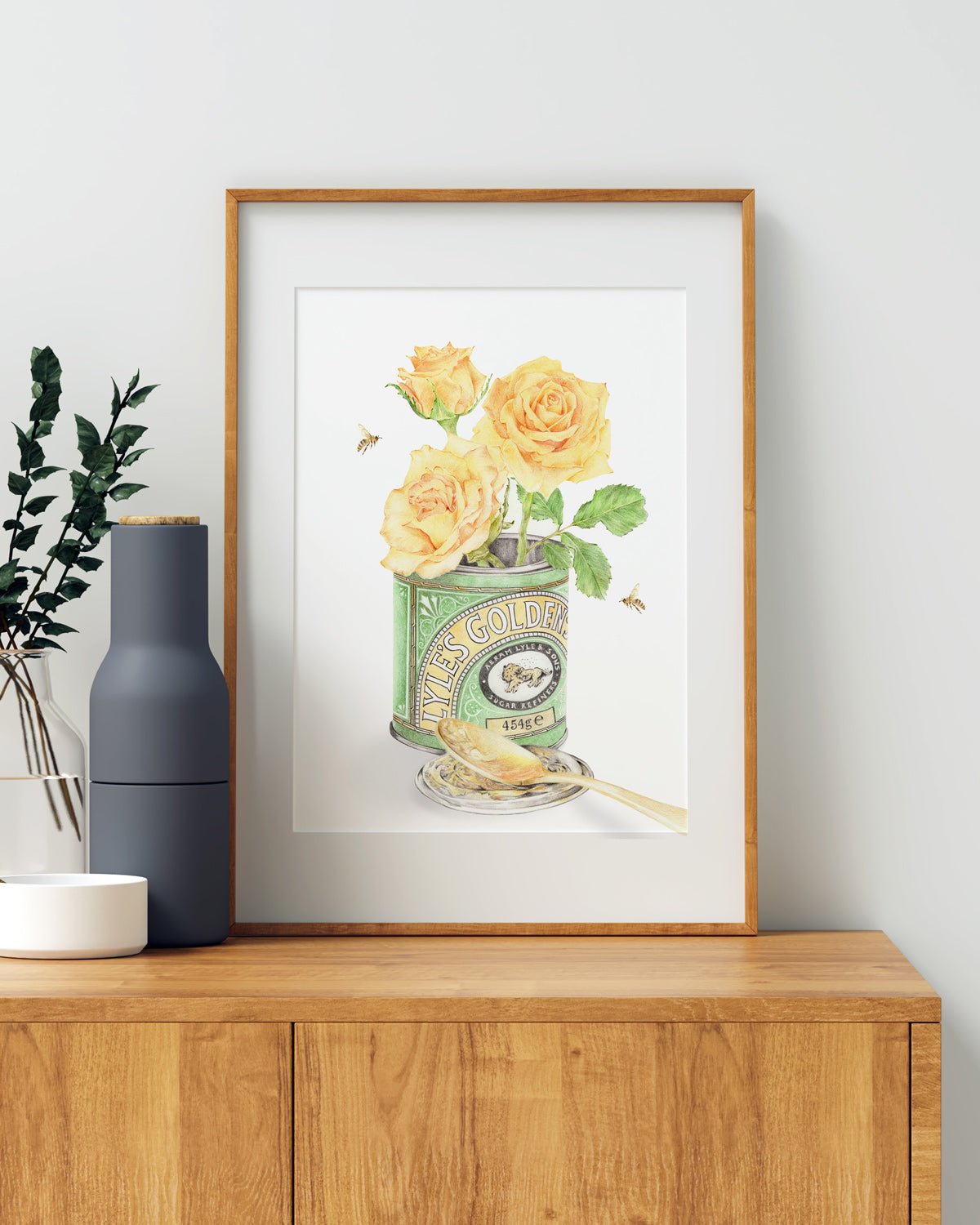 A Spoonful of Sunshine hand-signed art print displayed in a bright, warm Australian home interior