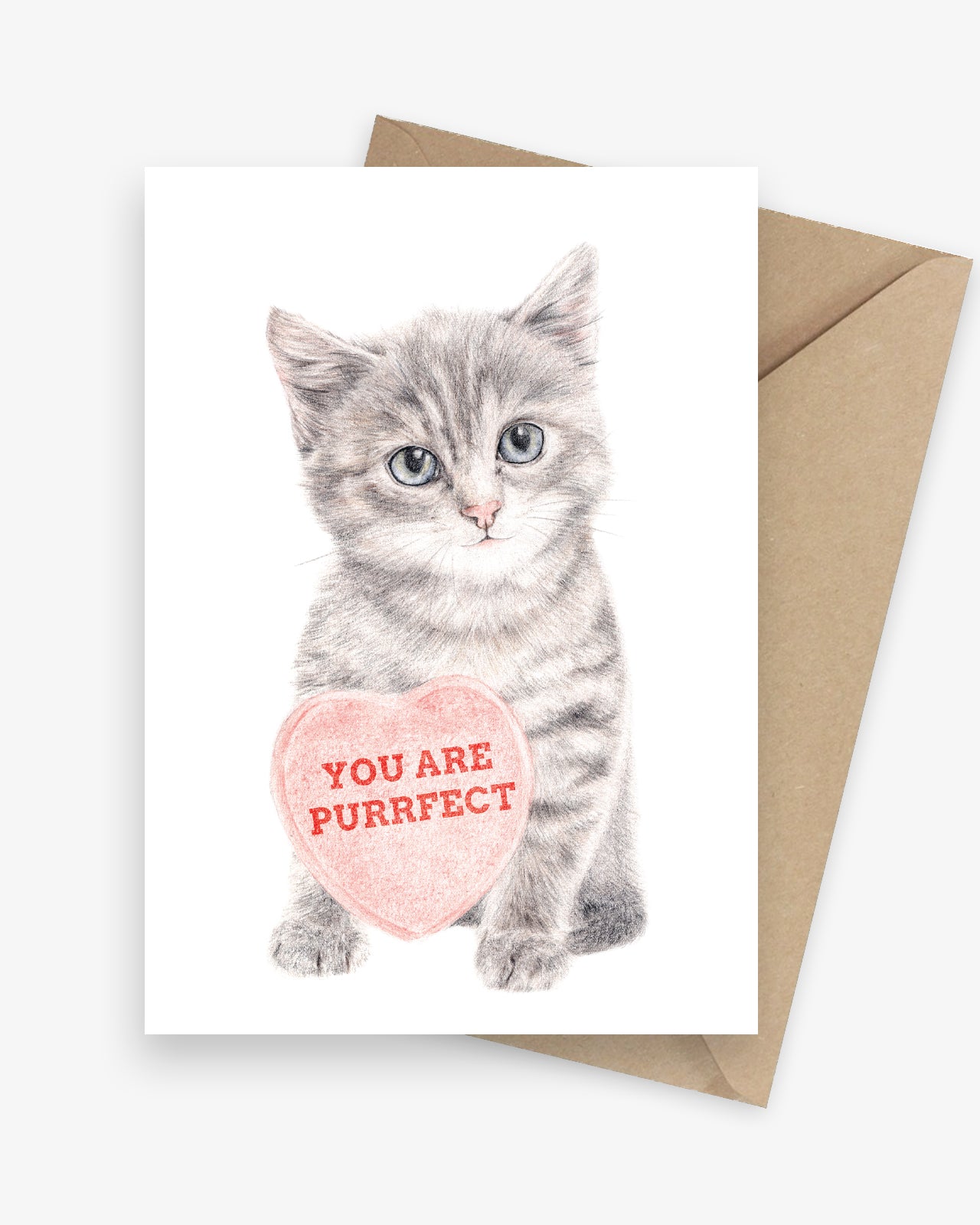 Greeting card featuring a kitten holding a big love heart.