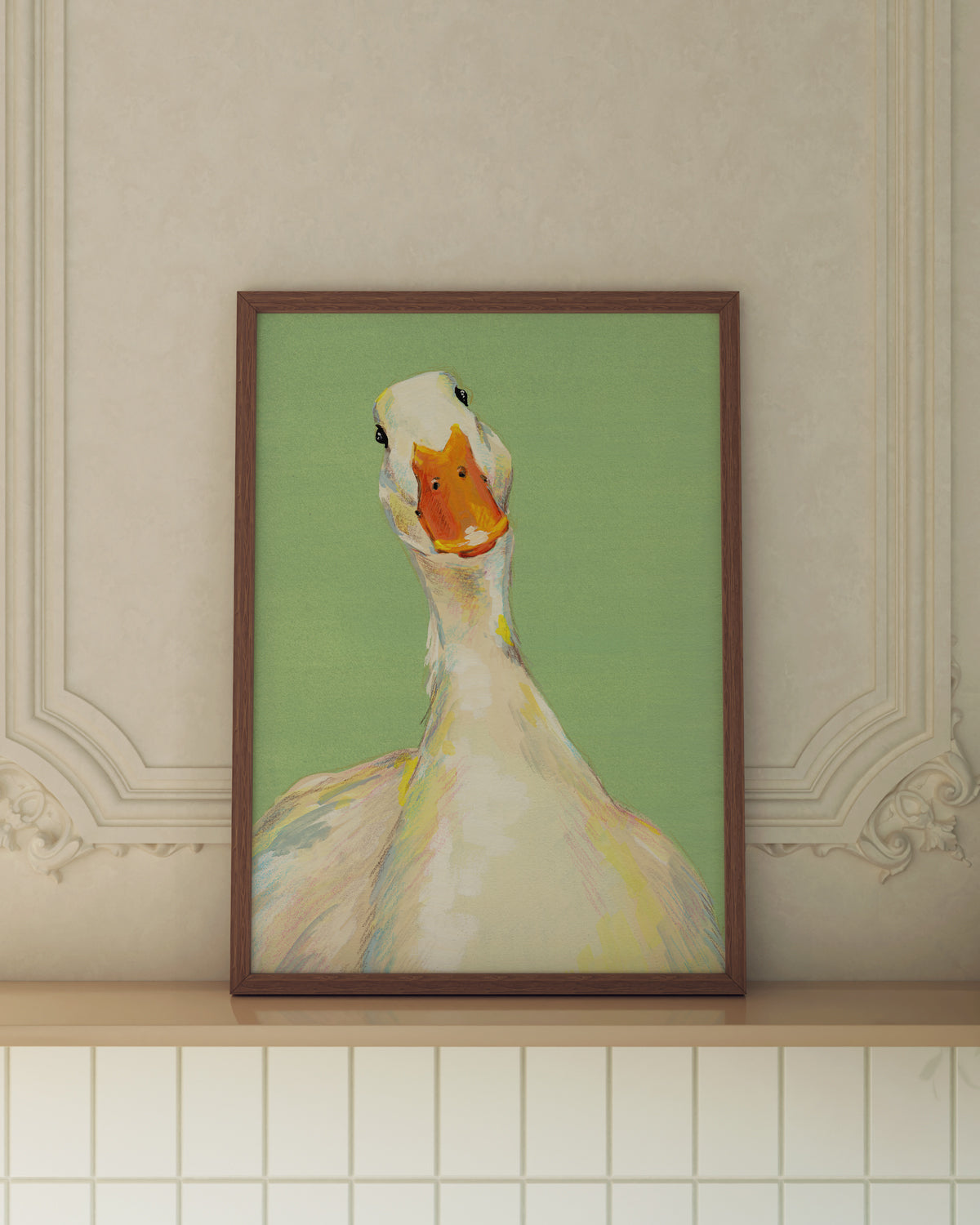Framed painting of a goose on a green background, displayed on a wall.