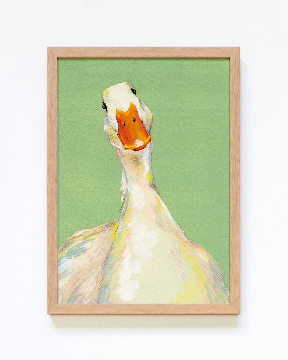 Framed artwork of a goose on a green background