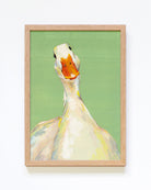 Framed artwork of a goose on a green background