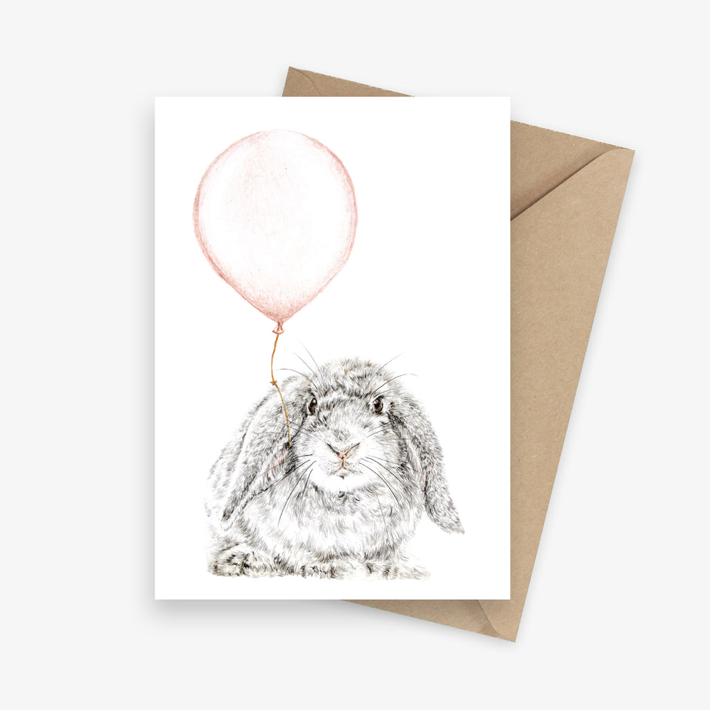 Birthday card featuring a lop-eared bunny with a pink balloon.