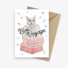 Bon voyage greeting card featuring a cat in a suitcase with confetti.