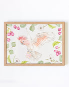 Framed pink cockatoo nursery artwork | Treat Brigade