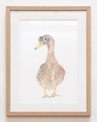 Framed nursery wall art of a duck with goggles