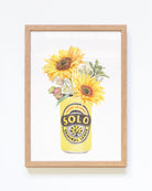 Framed botanical prints with Australian iconic Solo drink