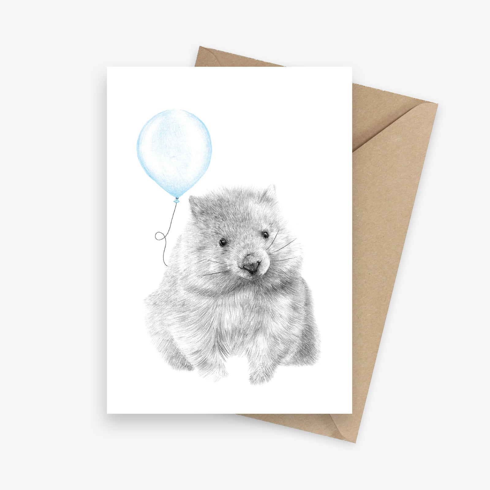 Birthday card featuring an Australian native wombat holding a blue balloon.