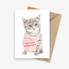 Greeting card featuring a kitten holding a big love heart.